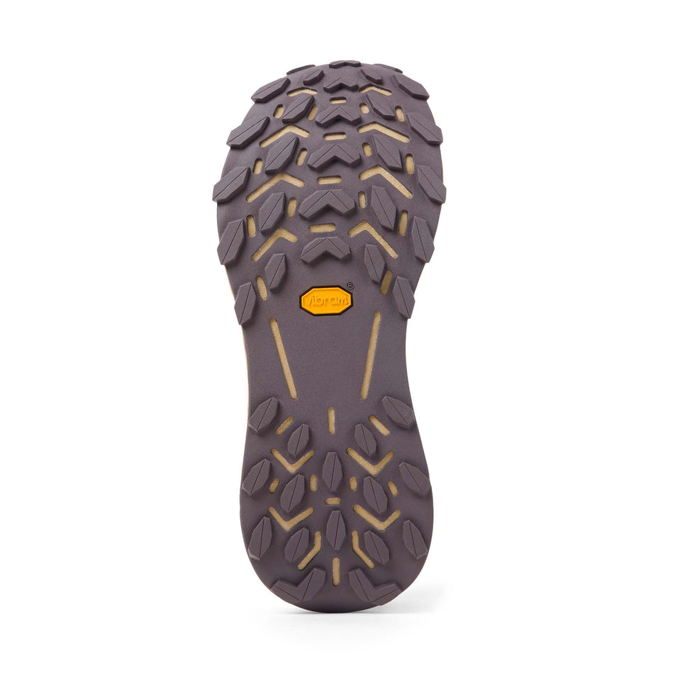 The outsole of the right shoe from a pair of NNormal Cadí Running Shoes in the Beige colourway.