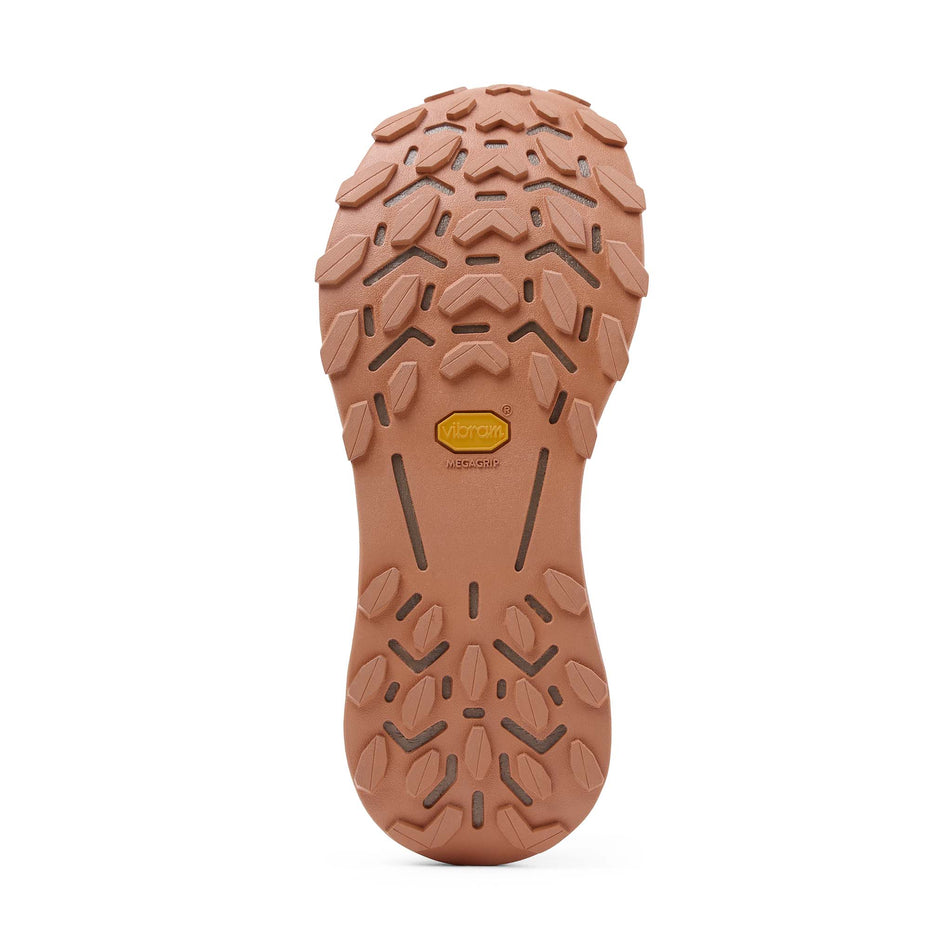 The outsole of the right shoe from a pair of NNormal Men's Cadí Running Shoes in the Brown colourway.