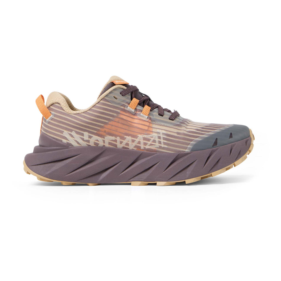 Lateral view of the right shoe from a pair of NNormal Women's Cadí Running Shoes in the Beige colourway.