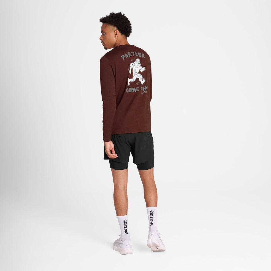 Back view of a model wearing the SAYSKY Men's Statement Pace Long Sleeve in the Red colourway. (8781022068898)