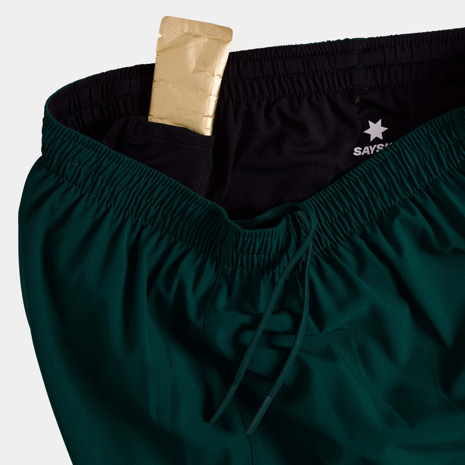 The gel storage pouch on the inner waist of the SAYSKY Men's Pace Shorts 5