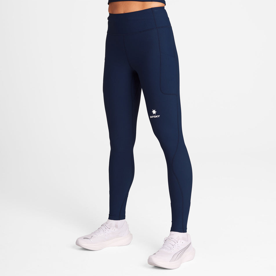 Front view of a model wearing the SAYSKY Women's Combat+ Rib Long Tights in the Blue colourway. (8730937196706)
