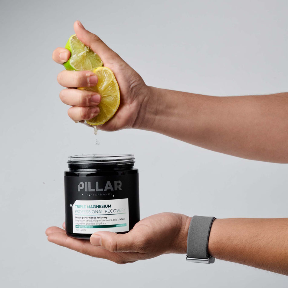 Front view of the PILLAR Performance Triple Magnesium Professional Recovery Powder in the Lemon & Lime flavour - Glass Jar