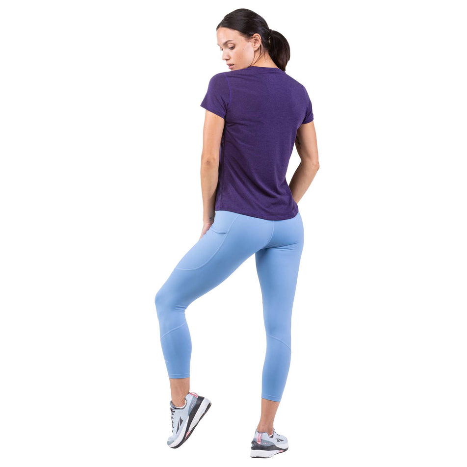 Back view of a model wearing a Ronhill Women's Tech Tencel S/S Tee in the Imperial Marl/Ultraviolet colourway (7742569709730)