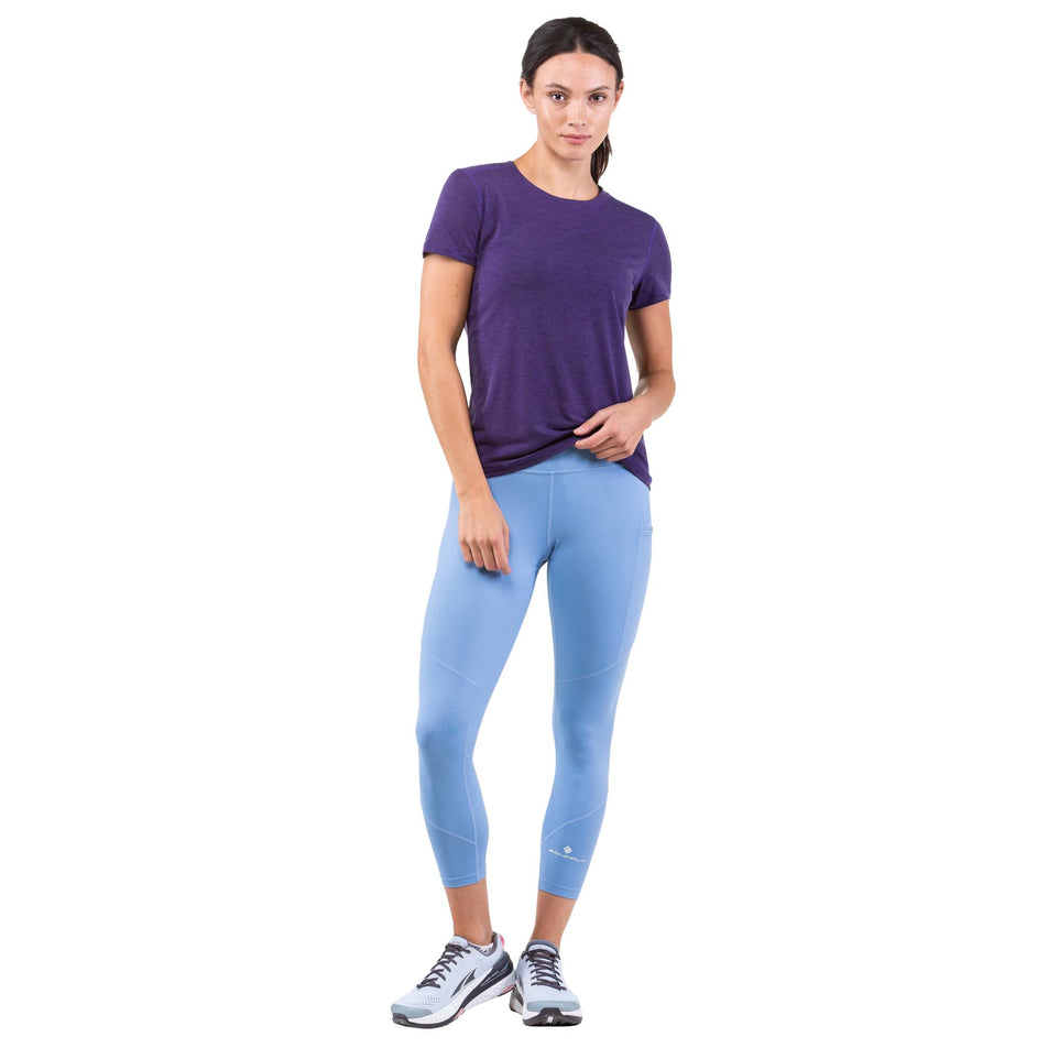 Front view of a model wearing a Ronhill Women's Tech Tencel S/S Tee in the Imperial Marl/Ultraviolet colourway (7742569709730)