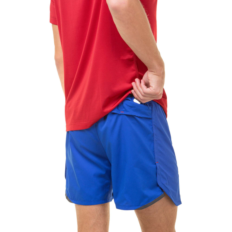Back view of a model wearing a pair of Ronhill Men's Tech Revive 5