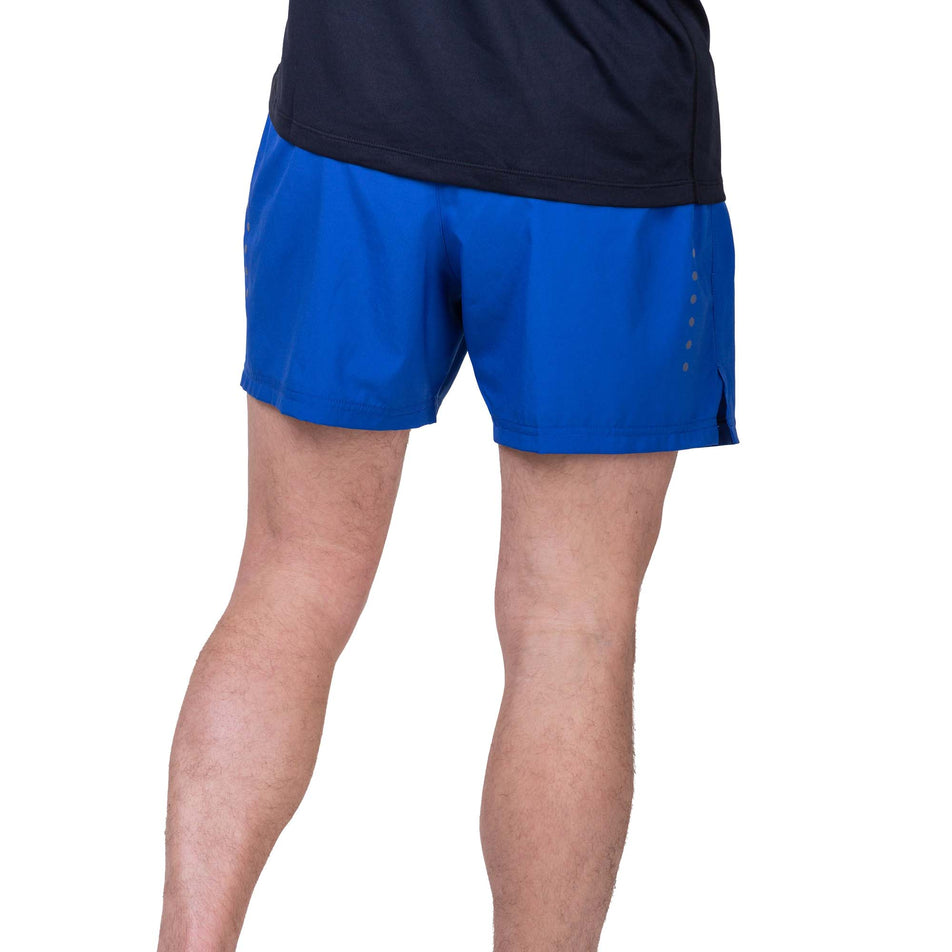 Back view of a model wearing the Ronhill Men's Core 5