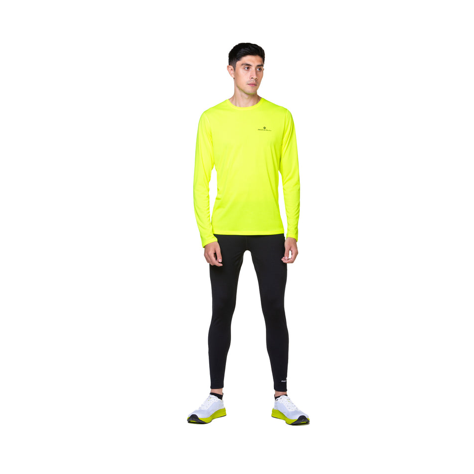 Front view of a model wearing the Ronhill Men's Core Tight in the All Black colourway. (8583350550690)