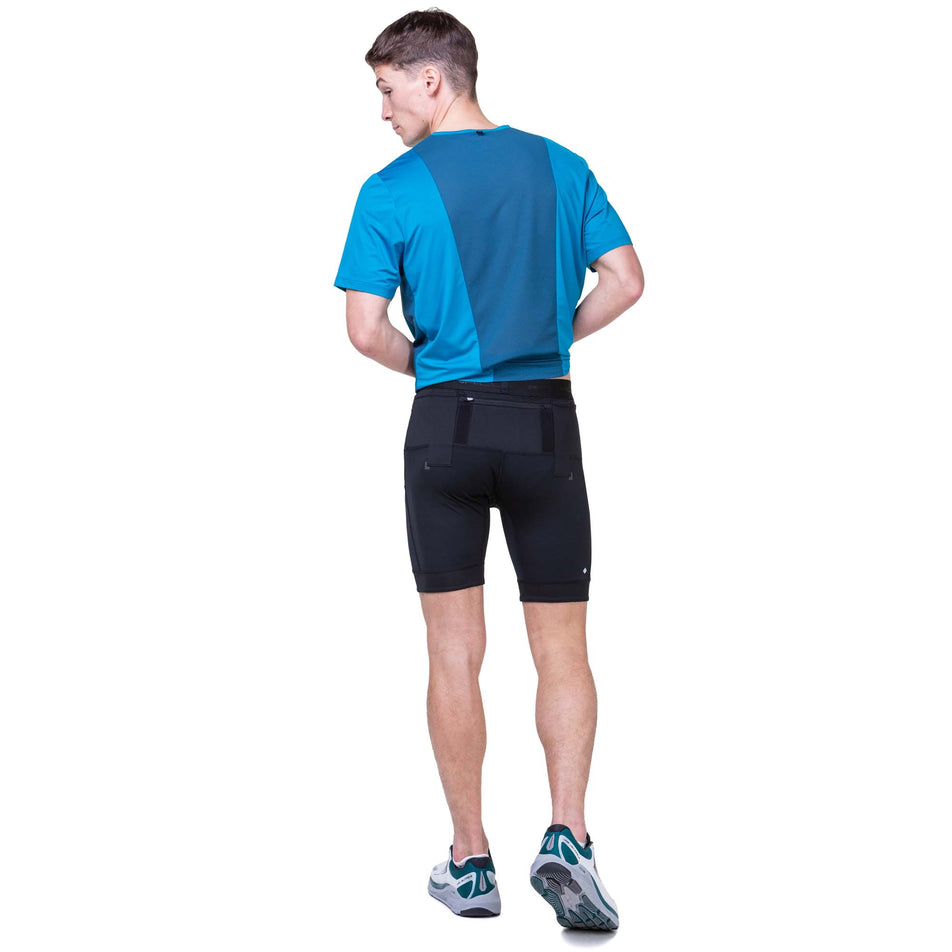 Back view of a model wearing the Ronhill Men's Tech Stretch Ultra 8
