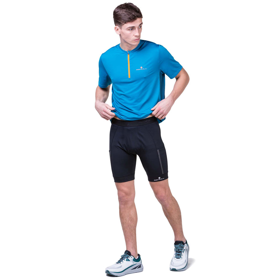 Front view of a model wearing the Ronhill Men's Tech Stretch Ultra 8