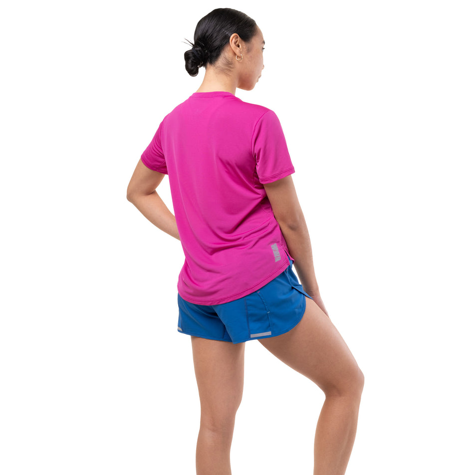 Angled view of a model wearing the Ronhill Women's Tech 4.5