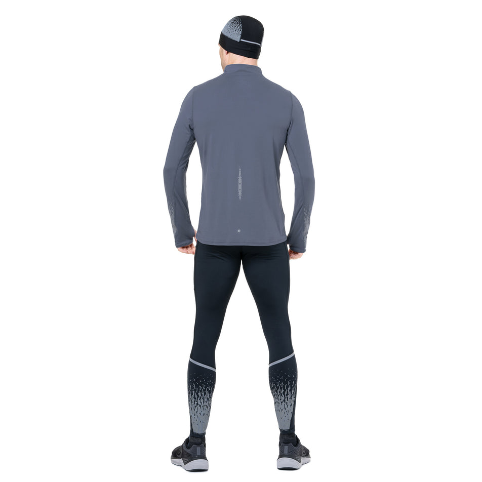 Back view of a model wearing the Ronhill Men's Tech Reflect 1/2 Zip in the Anchor/Reflect colourway. (8747638522018)