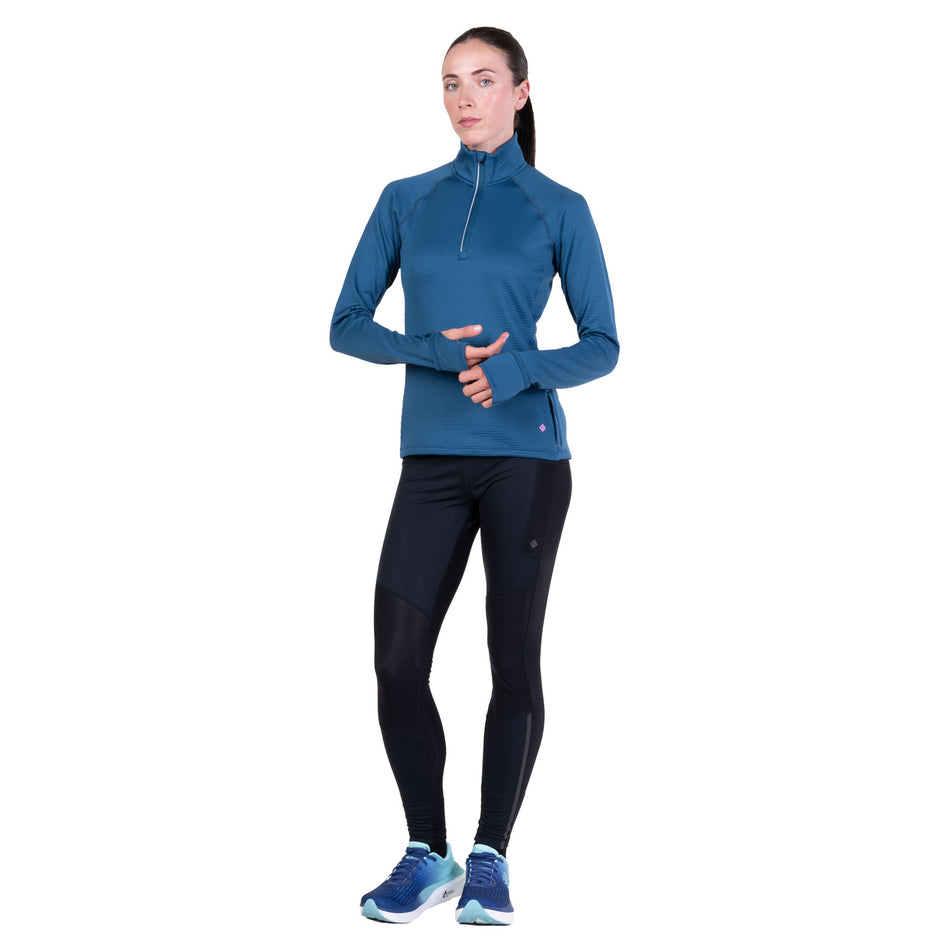 Front view of a model wearing the Ronhill Women's Tech Winter 1/2 Zip in the Legion Blue/Orchid colourway.