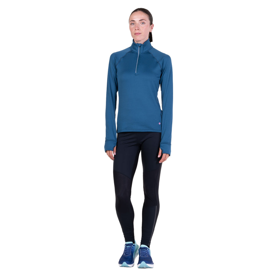 Front view of a model wearing the Ronhill Women's Tech Winter 1/2 Zip in the Legion Blue/Orchid colourway.