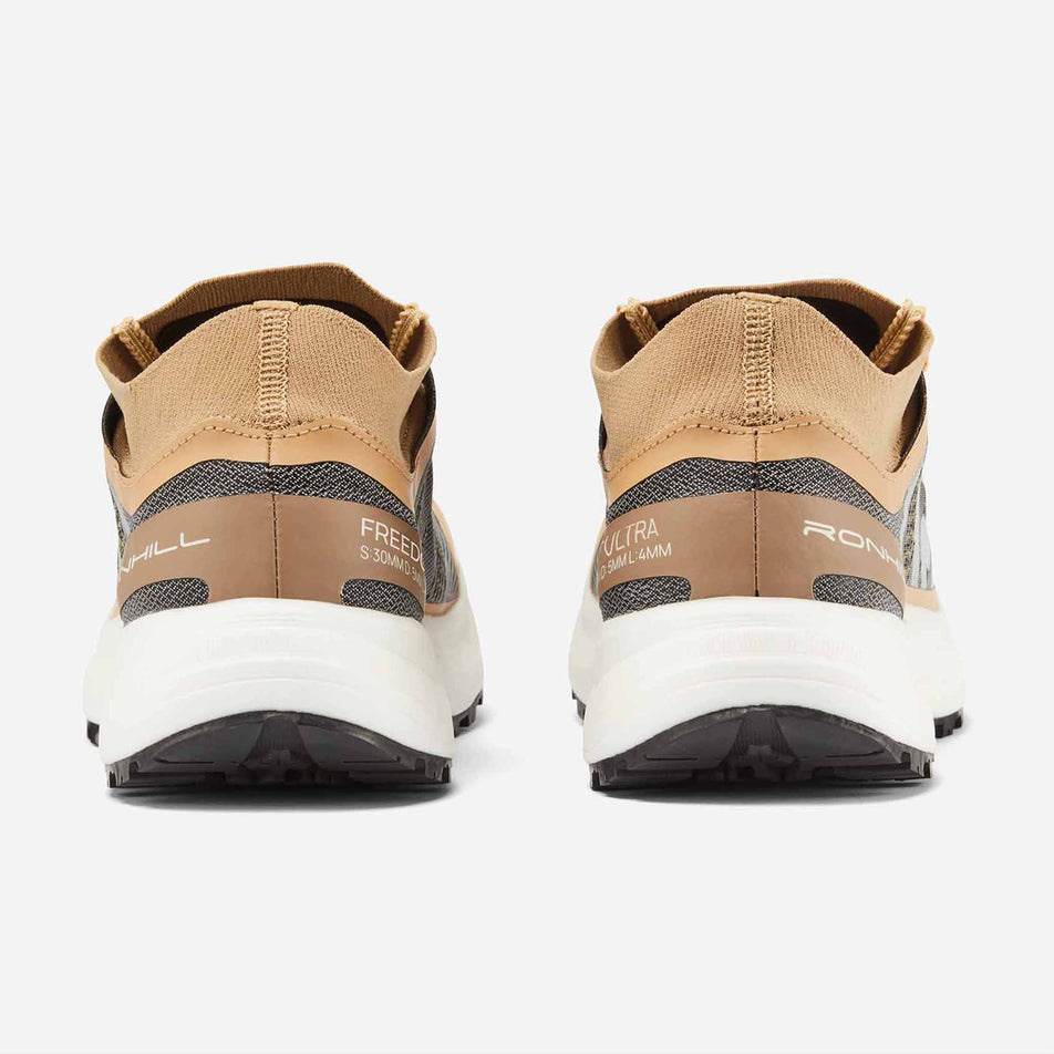 The back of a pair of Ronhill Women's Freedom Ultra Running Shoes in the Sand colourway. (8601106776226)