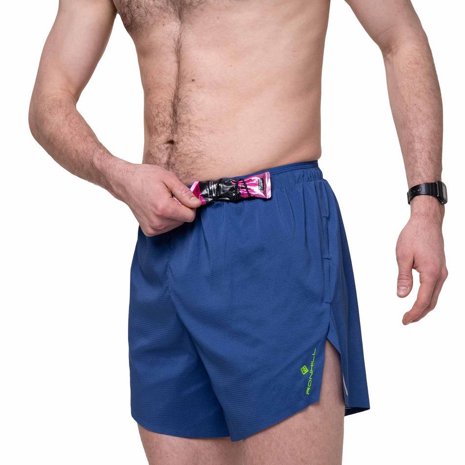 Front view of a model wearing the Ronhill Men's Tech Race 5