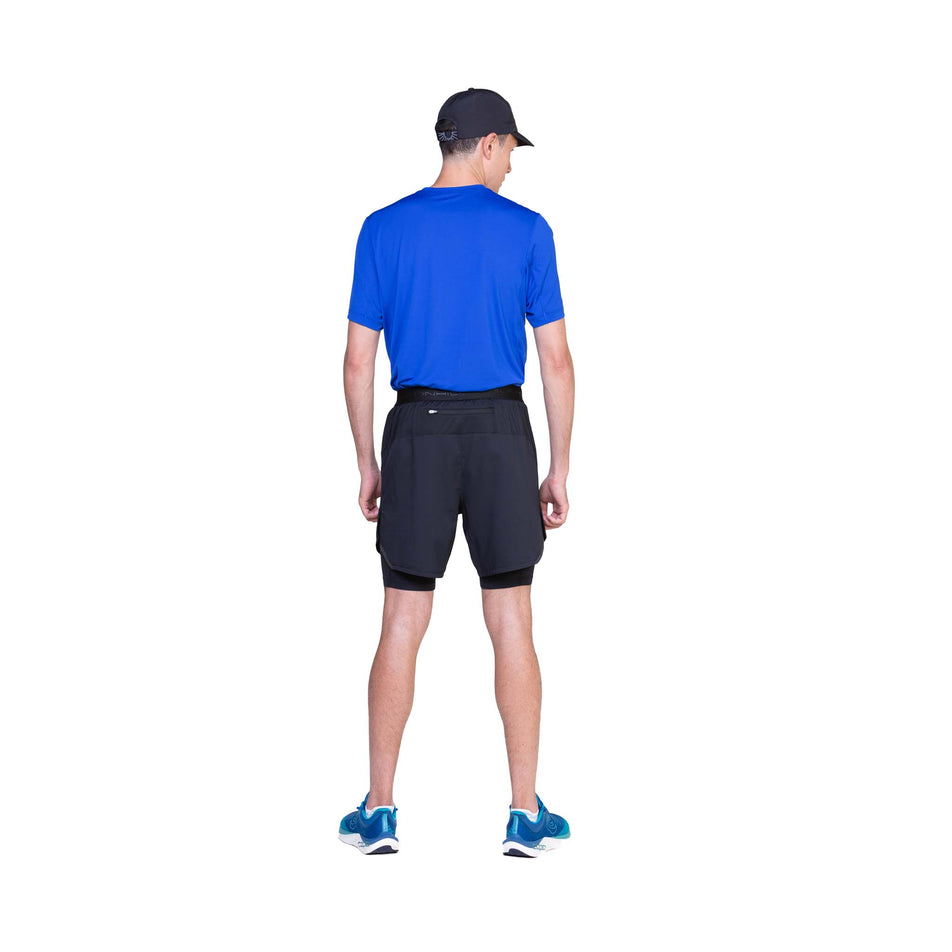 Back view of a model wearing the Ronhill Men's Tech 7