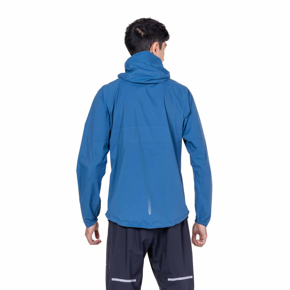 Back view of a model wearing the Ronhill Men's Tech Storm Jacket in the Glacier/Ronhill Red colourway.