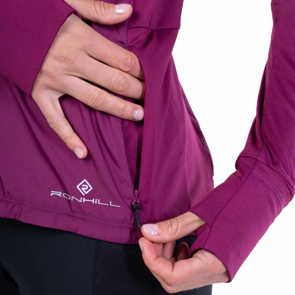 The zip pocket on the Ronhill Women's Tech Wind-Block 1/2 Zip in the Blackcurrant colourway.