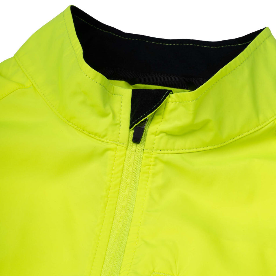 Close-up view of the collar of the Ronhill Men's Core Jacket in the Fluo Zest colourway.