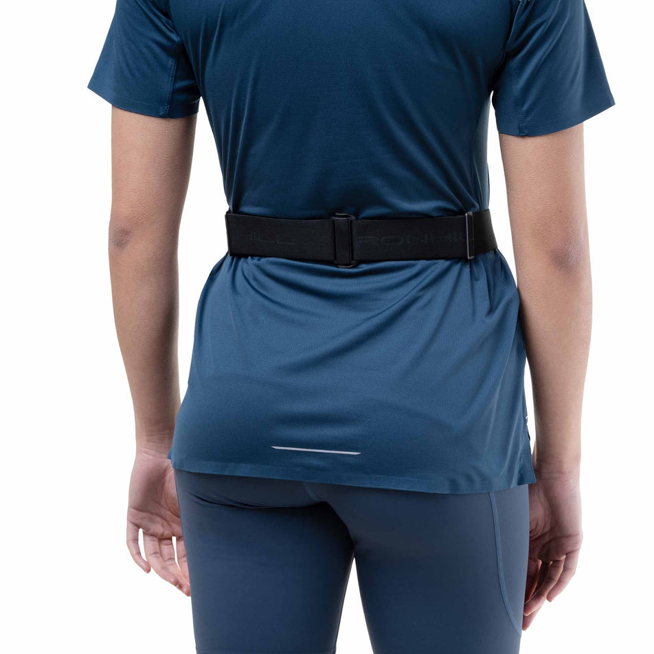 Back view of a model wearing the Ronhill Unisex Speed 90 in the Black/Ronhill Red colourway.