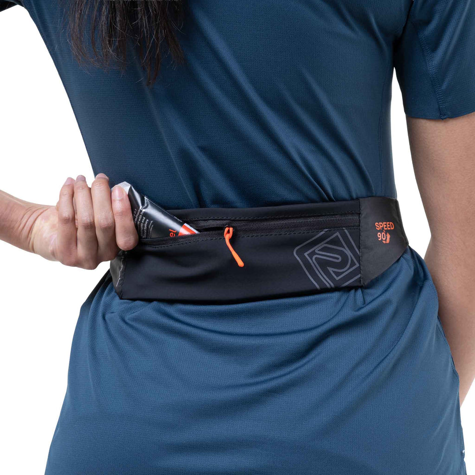 The zip pocket on the Ronhill Unisex Speed 90 in the Black/Ronhill Red colourway.