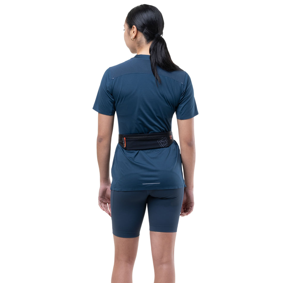 Back view of a model wearing the Ronhill Unisex Speed 90 in the Black/Ronhill Red colourway.