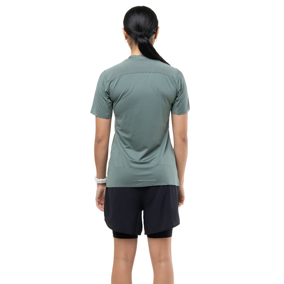 Back view of a model wearing the Ronhill Women's Tech All-Terrain S/S Tee in the Laurel colourway.