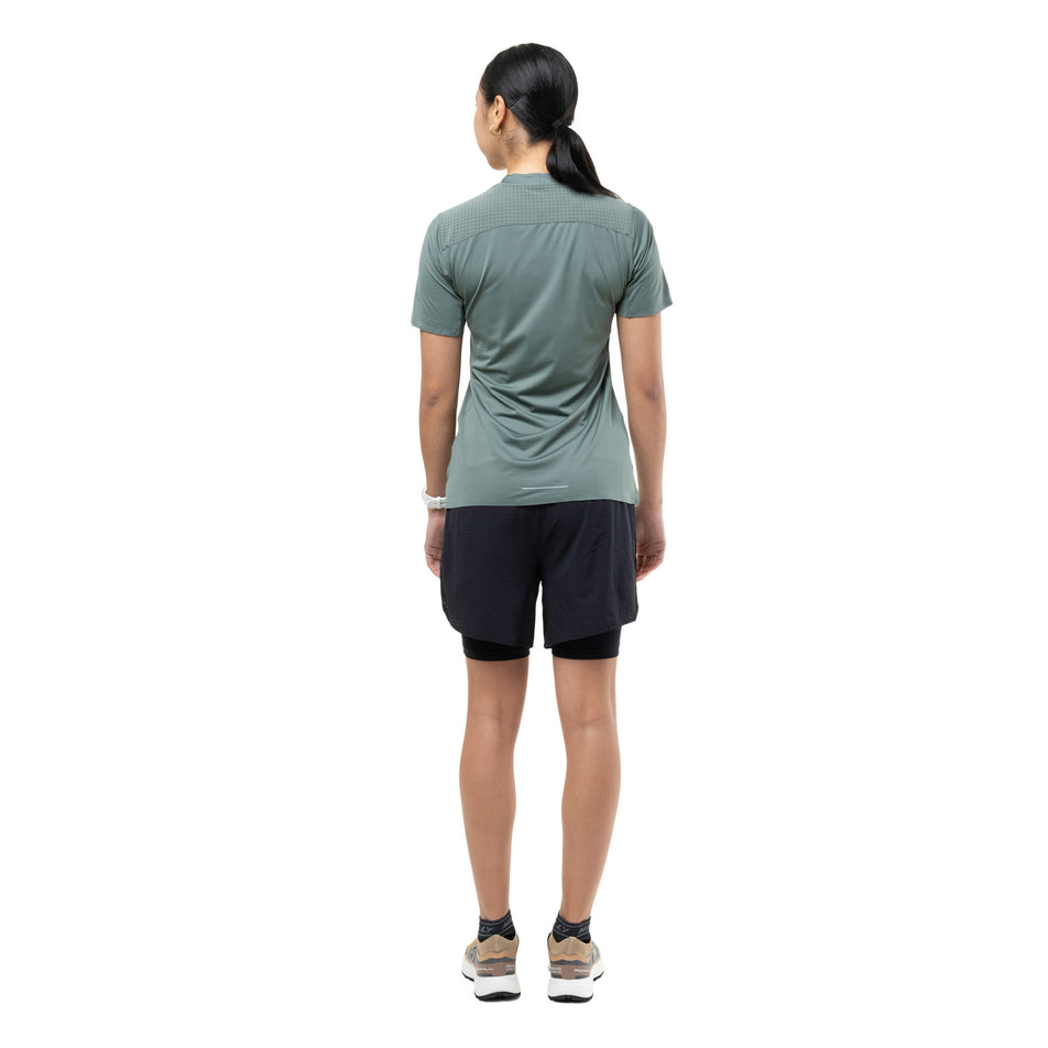 Back view of a model wearing the Ronhill Women's Tech All-Terrain S/S Tee in the Laurel colourway.