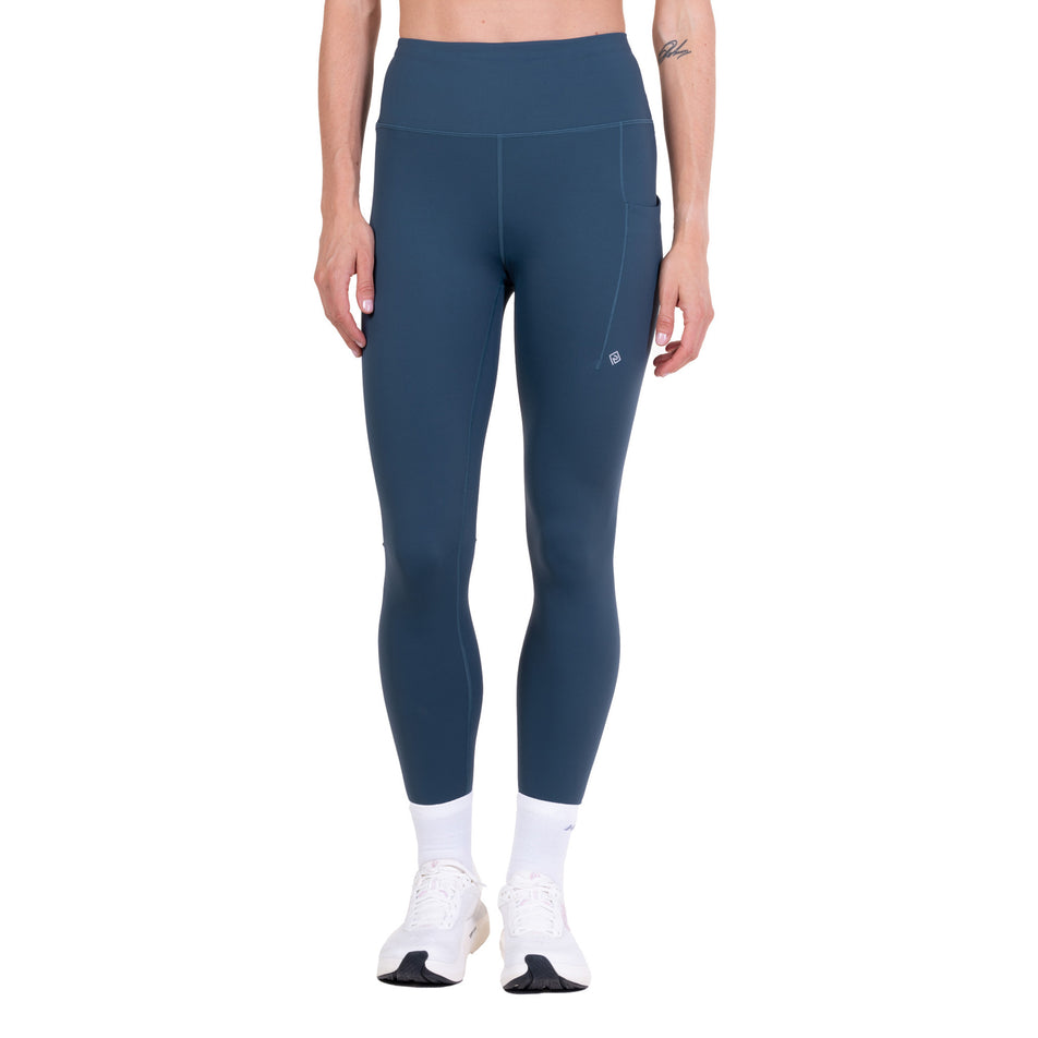 Front view of a model wearing the Ronhill Women's Tech Contour Tight in the Evening Haze colourway.