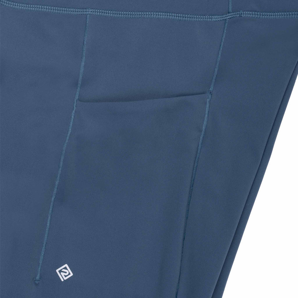 The stash pocket on the side of the Ronhill Women's Tech Contour Tight in the Evening Haze colourway.