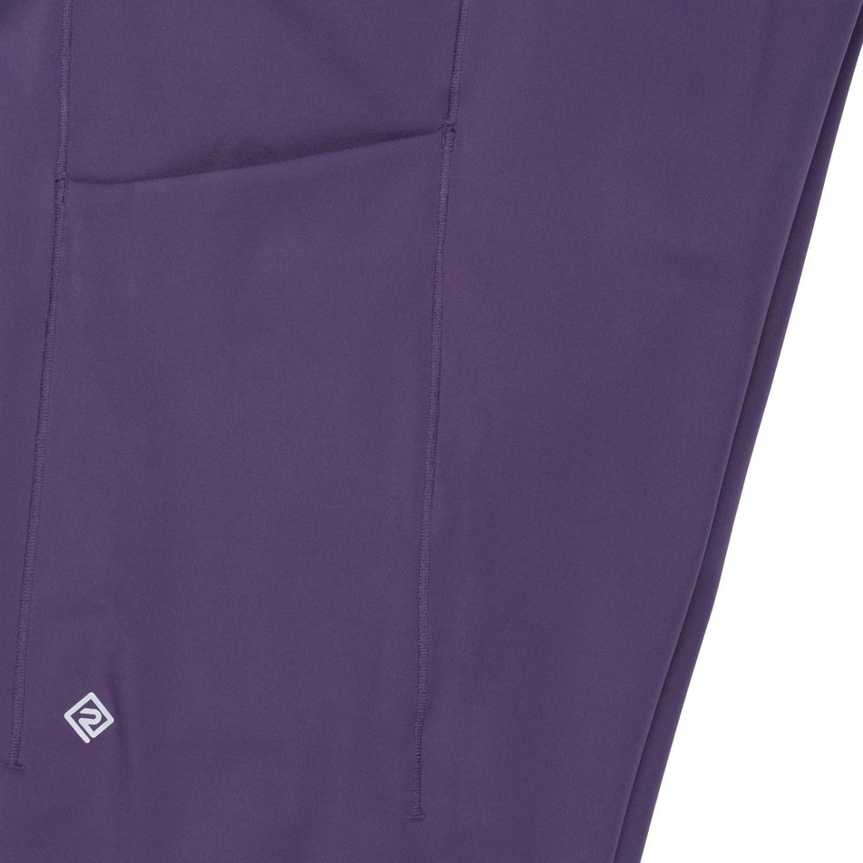 The side drop-in pocket on the Ronhill Women's Tech Contour Tight in the Noir Iris colourway.