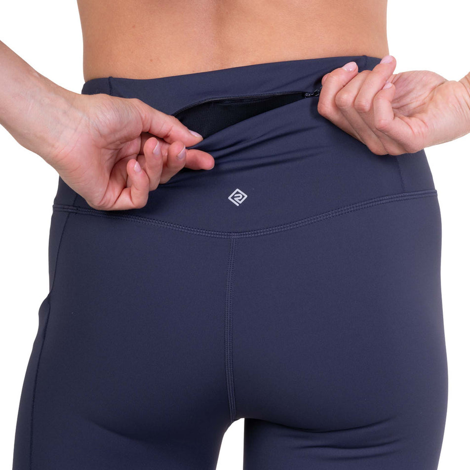 The zip pocket on the back of the Ronhill Women's Tech Contour Tight in the Polar Night colourway.