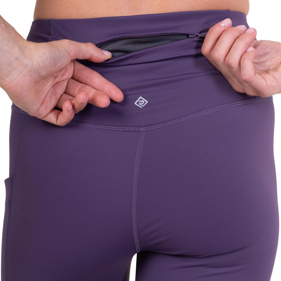 The zip pocket on the back of the Ronhill Women's Tech Contour Tight in the Noir Iris colourway.