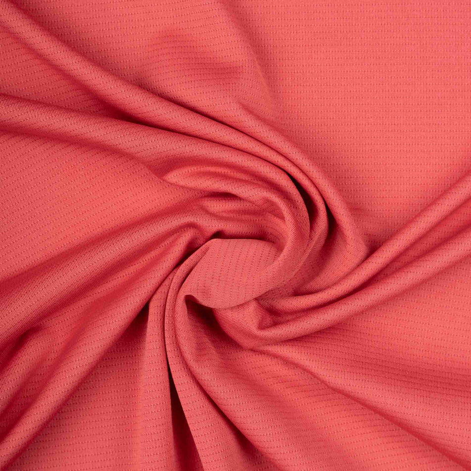 Close-up view of the fabric on the Ronhill Women's Core S/S Tee in the Sumac colourway.