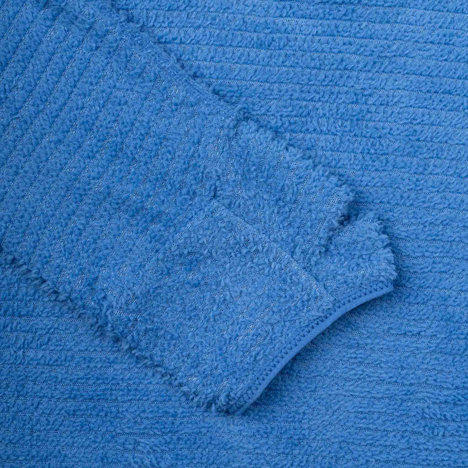 The sleeve of the Ronhill Women's Tech Winter Primaloft Hoodie in the Lumiere/Sumac colourway.