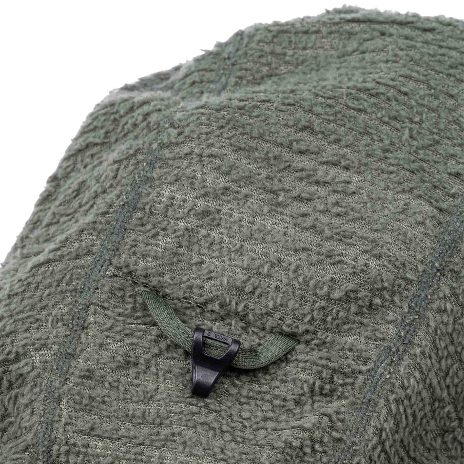 The hood toggle on the Ronhill Men's Tech Winter Primaloft Hoodie in the Kelp/Zest colourway.