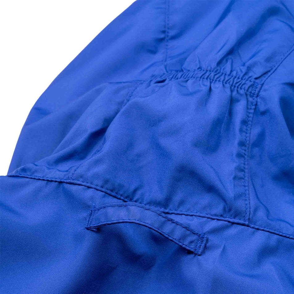 The back of the hood on the Ronhill Women's Tech Reflect Jacket in the Blue Violet/Reflect colourway.