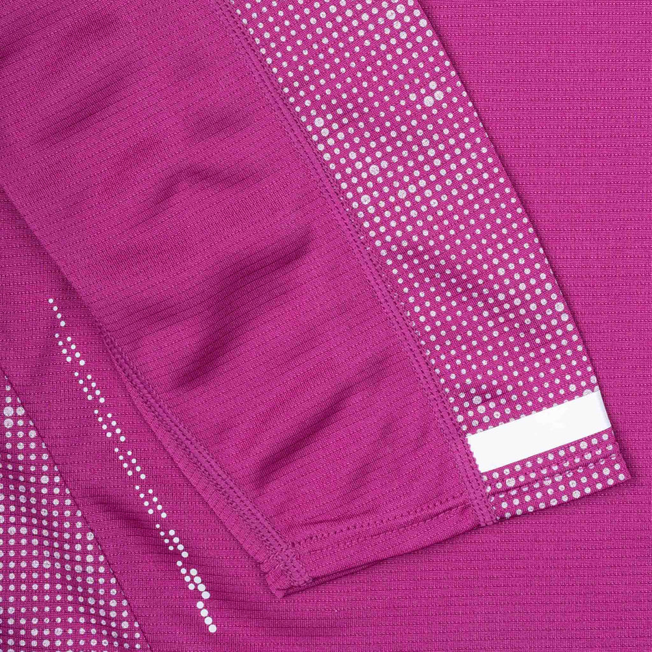 Close-up view of the reflective pattern on the Ronhill Women's Tech Reflect L/S Tee in the Blackcurrant/Reflect colourway.