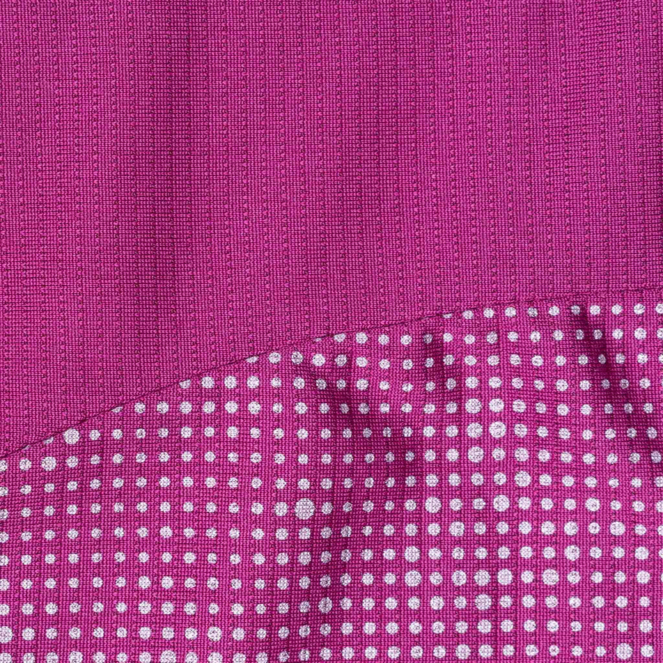 Close-up view of the reflective pattern on the Ronhill Women's Tech Reflect L/S Tee in the Blackcurrant/Reflect colourway.