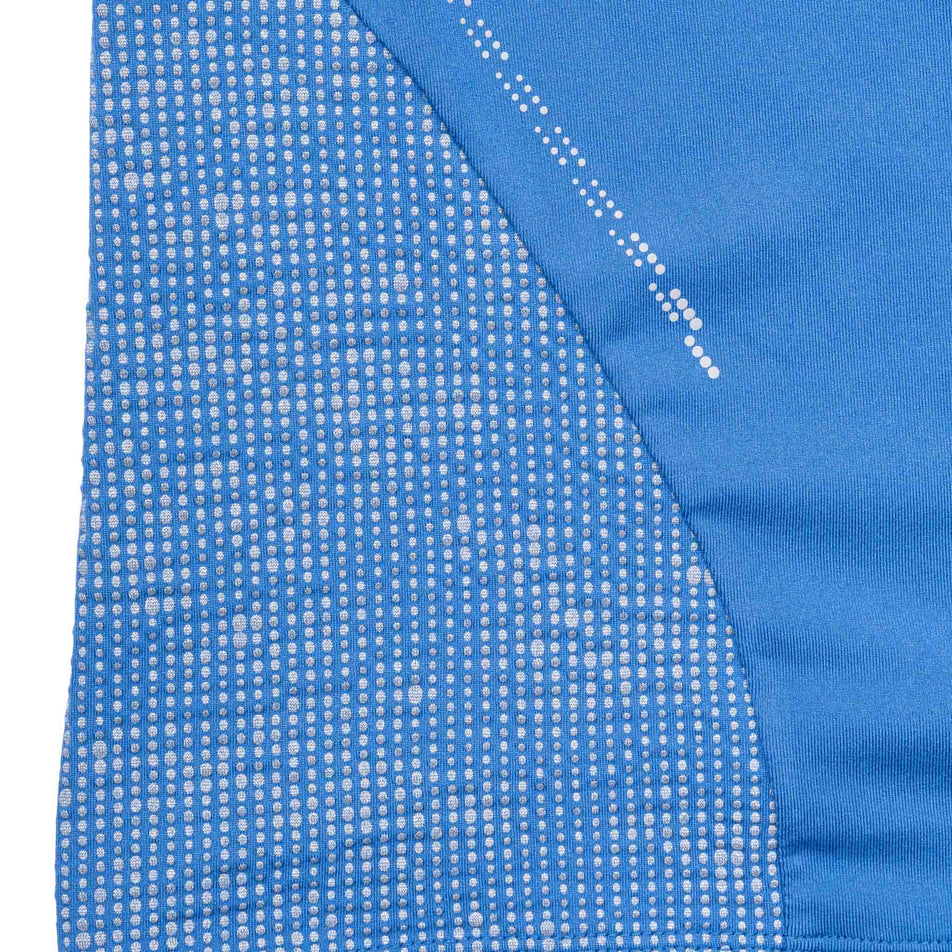 Close-up view of the reflective pattern on the Ronhill Women's Tech Reflect 1/2 Zip in the Lumiere/Reflect colourway.