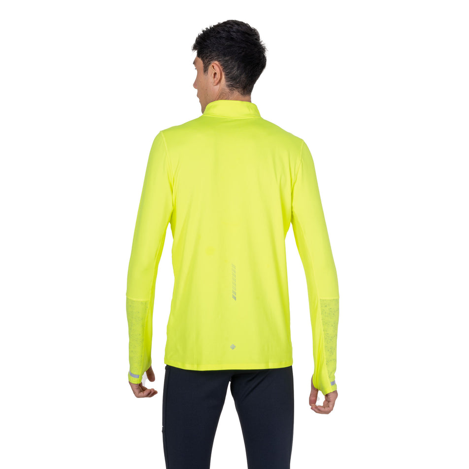 Back view of a model wearing the Ronhill Men's Tech Reflect 1/2 Zip in the Fluo Zest/Reflect colourway.