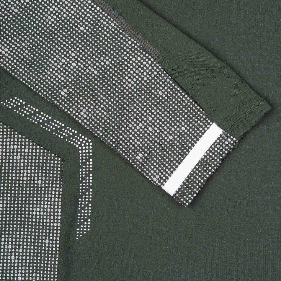 Close-up view of the reflective pattern on Ronhill Men's Tech Reflect 1/2 Zip in the Kelp/Reflect colourway.