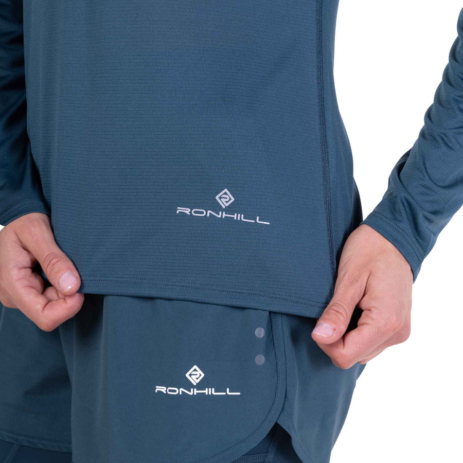 Close-up view of the Ronhill logo on the Ronhill Women's Core L/S Tee in the Evening Haze colourway.