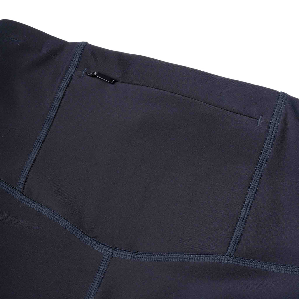The back zip pocket on the Ronhill Women's Tech Wind-Block Tight in the All Black colourway.