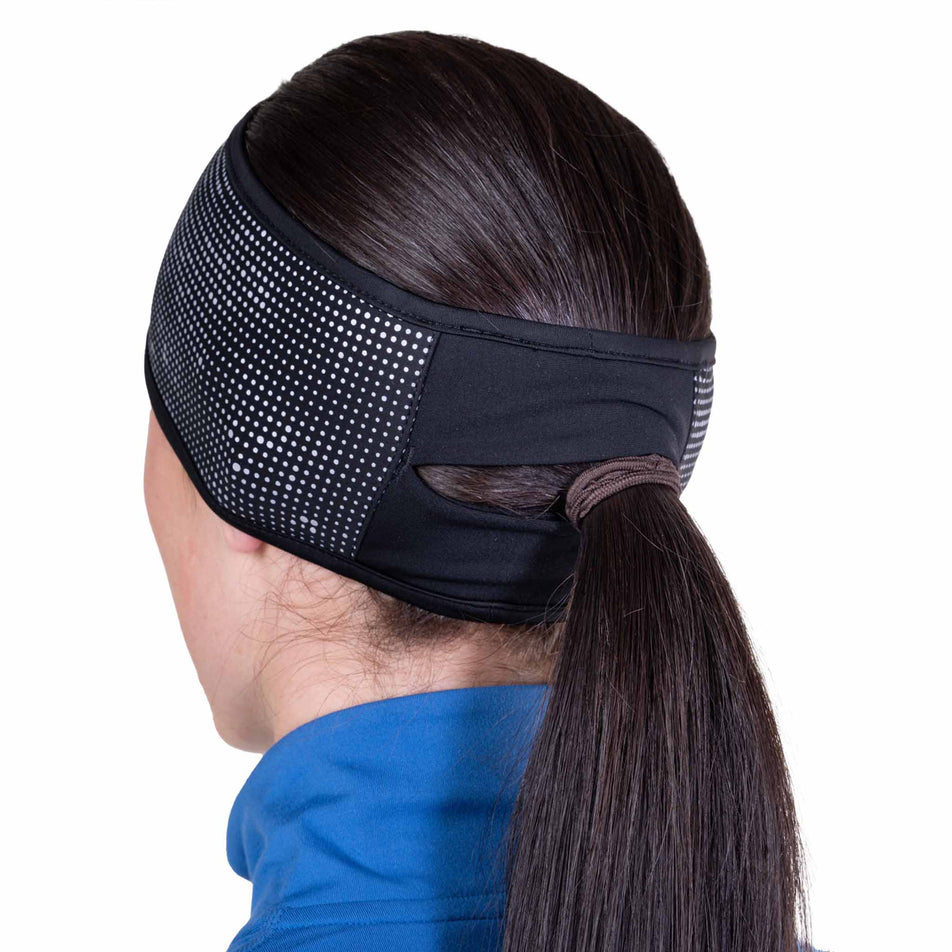 Back view of a model wearing the Ronhill Unisex Reflect Headband in the Black/Reflect colourway.