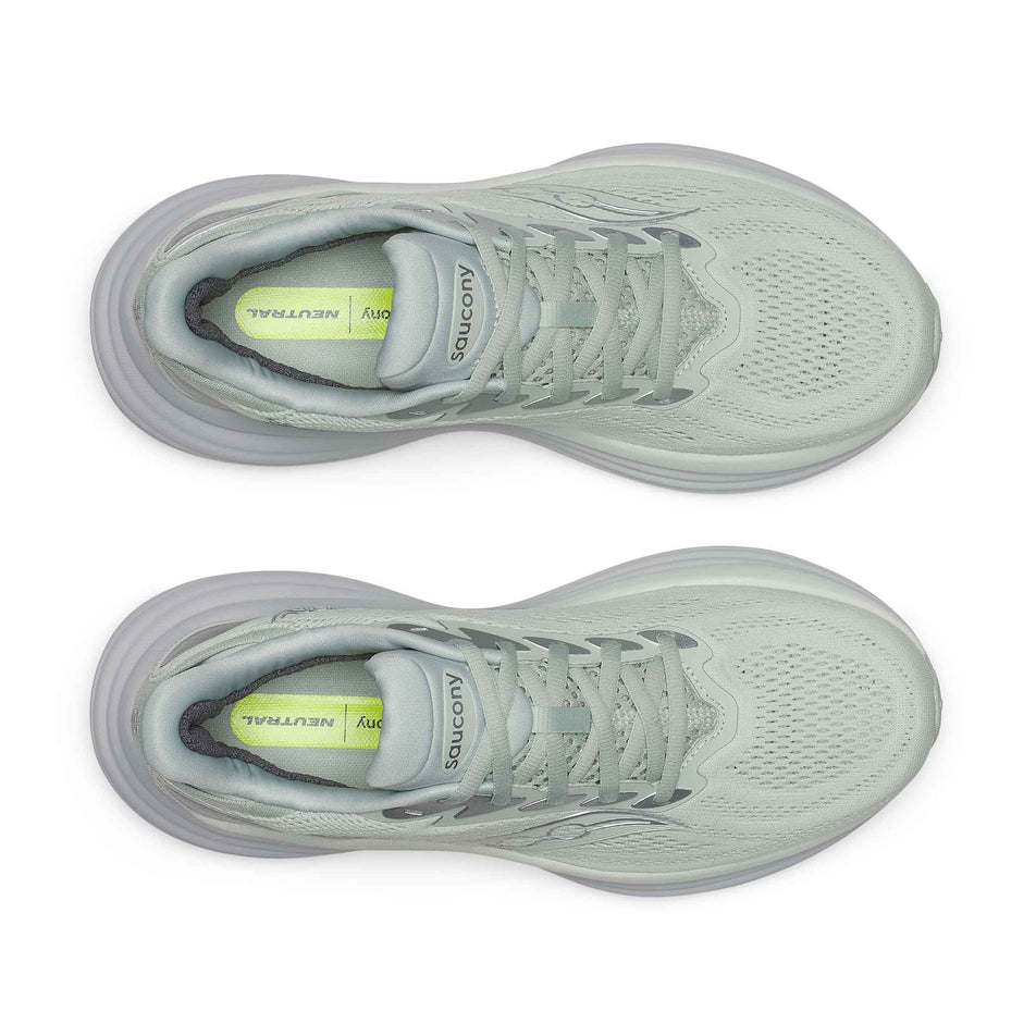 The uppers of a pair of Saucony Women's Triumph 24 Running Shoes in the Cast colourway.