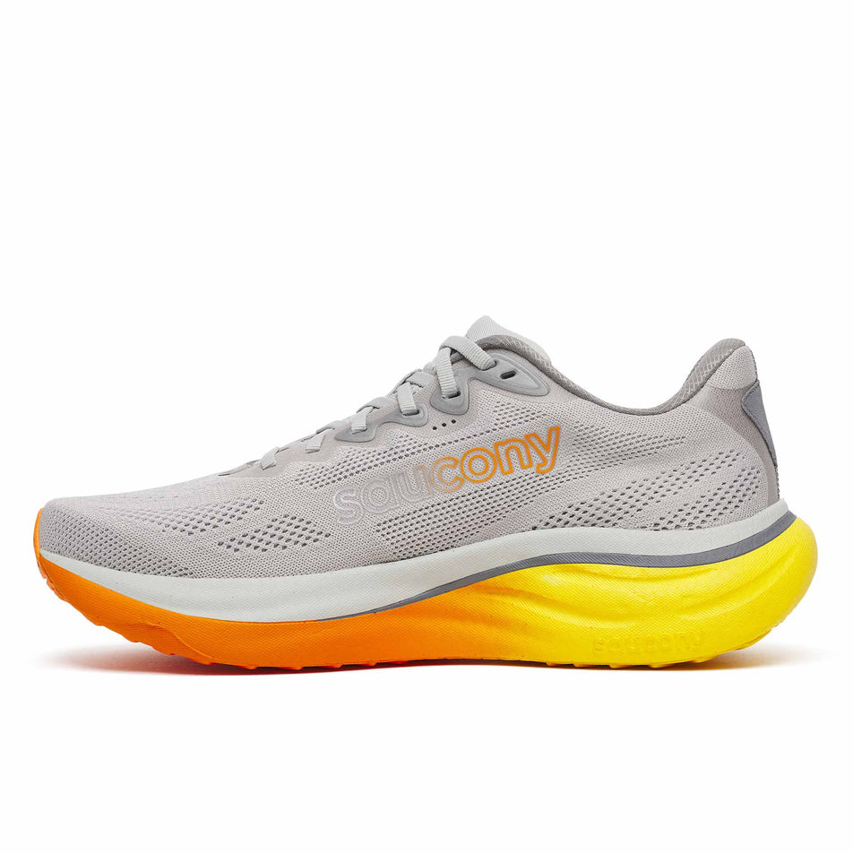 Medial view of the right shoe from a pair of Saucony Men's Ride 19 Running Shoes in the Cadet/Fuego colourway.