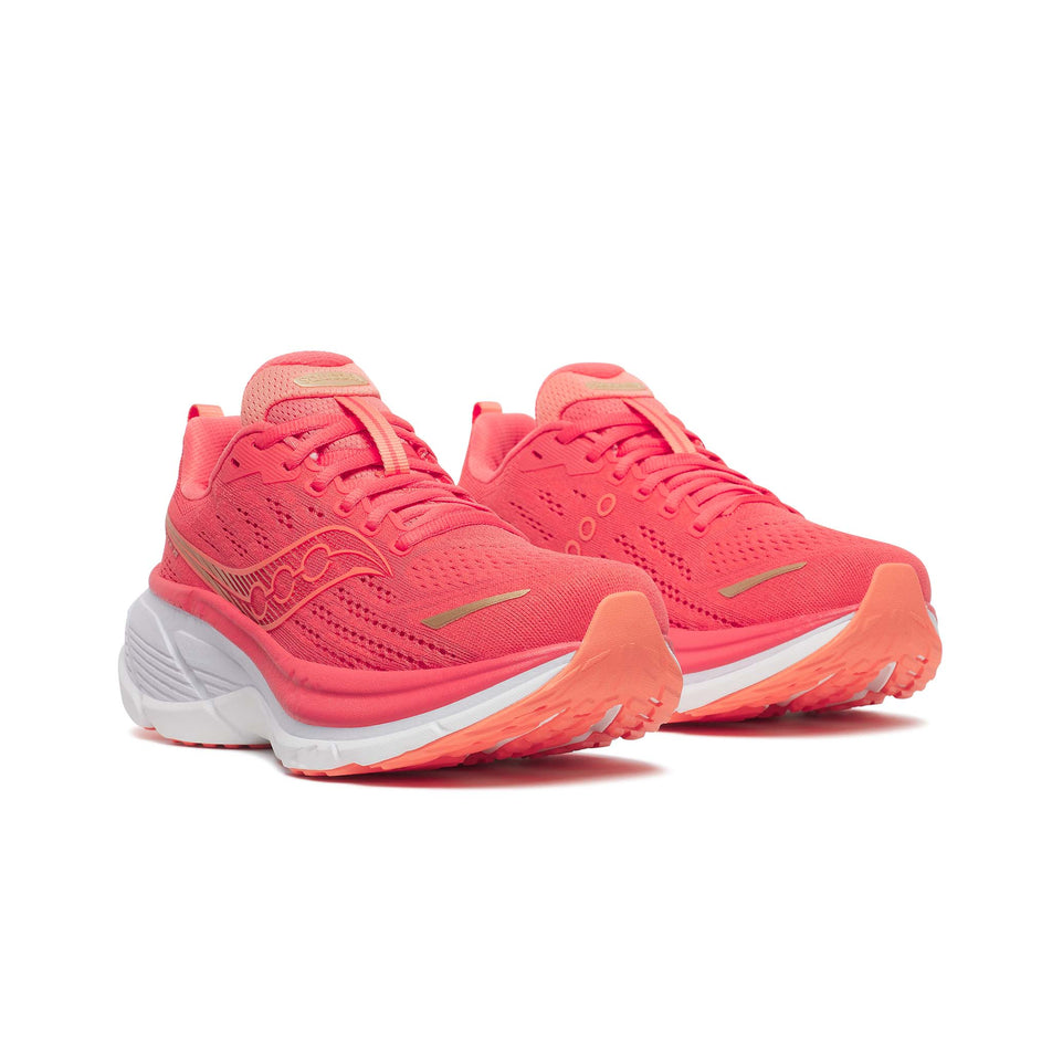 A pair of Saucony Women's Hurricane 25 Running Shoes in the Coral/Thistle  colourway. (8654995849378)