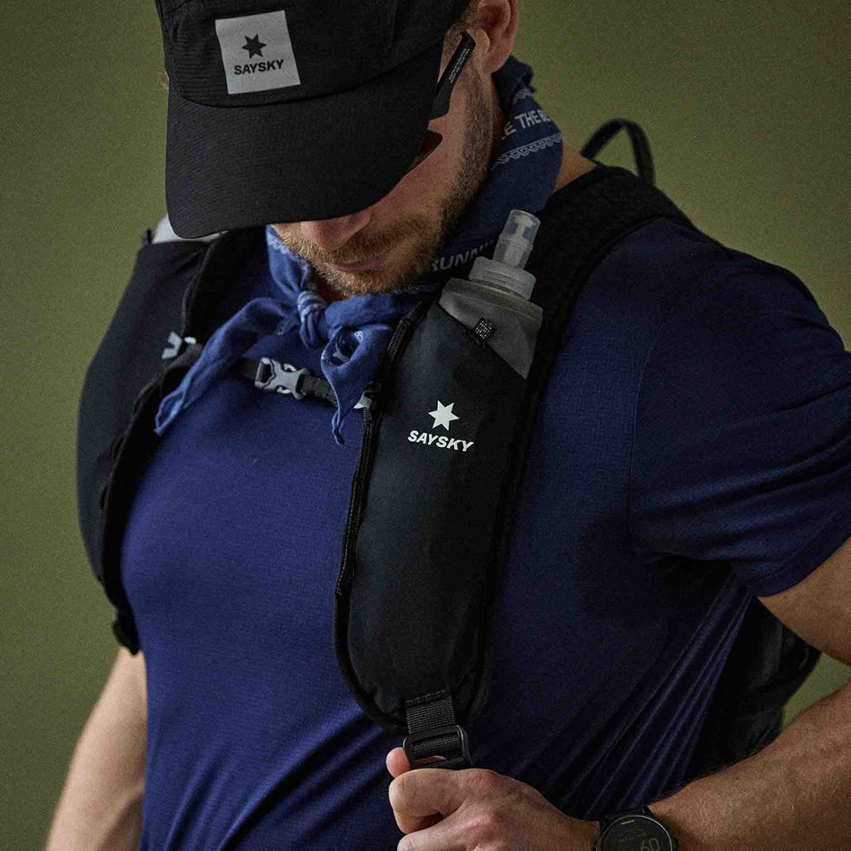 Front view of a model wearing the SAYSKY Unisex Commuter Backpack 14L in the Black colourway.